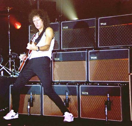 Brian May in front of his amp wall